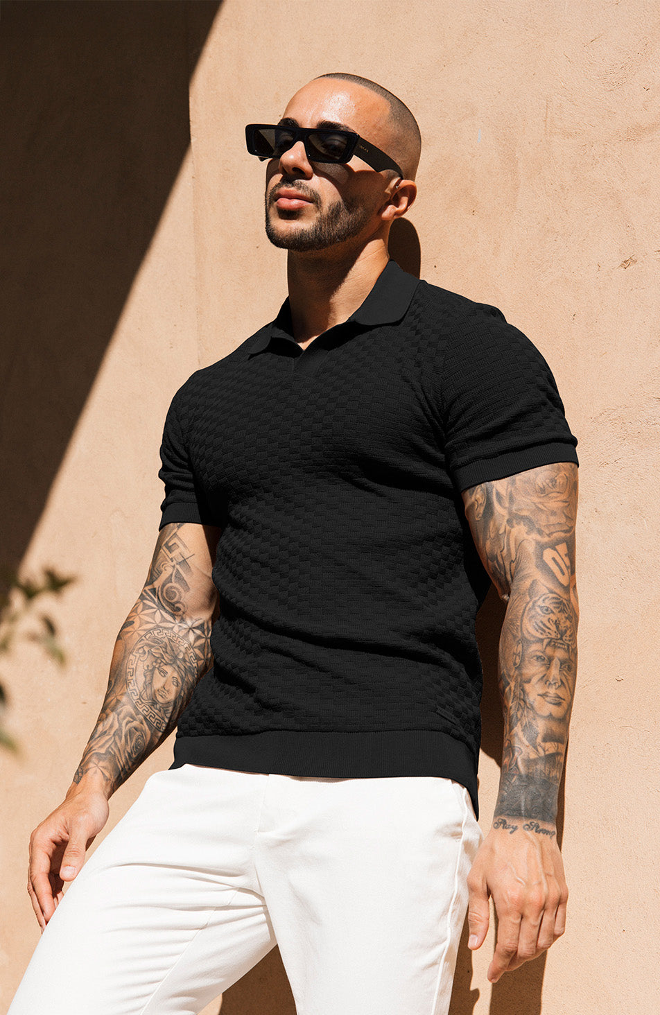 Nerano Slim Knit Polo in Black