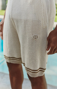 Model is 6'0 with a waist 28", wearing a W32