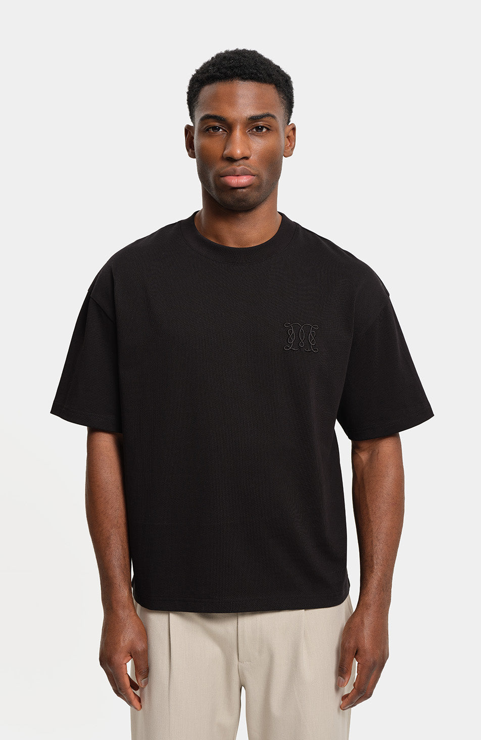 Embossed Monogram Back Logo T-shirt in Black