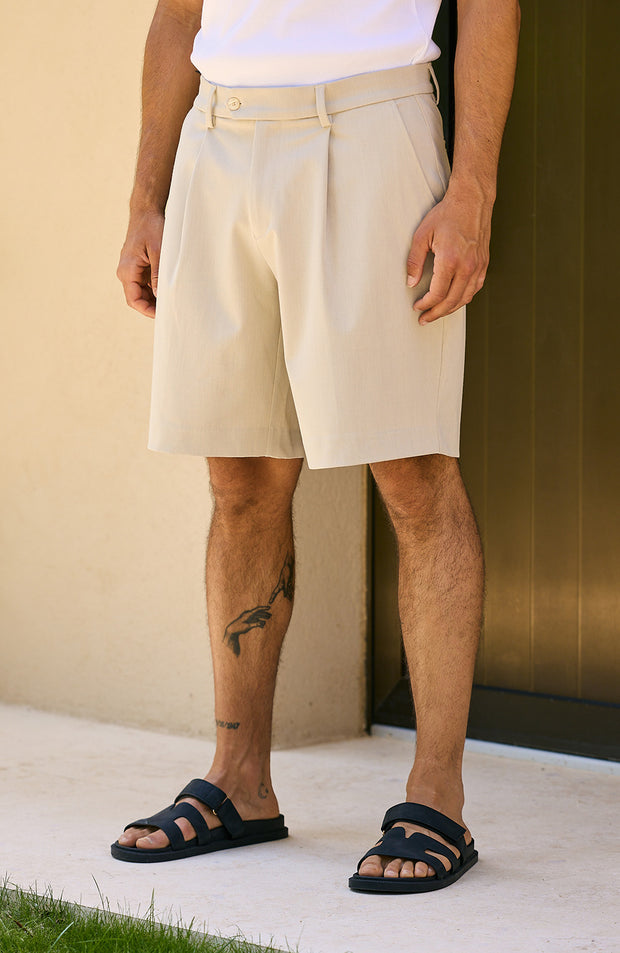 Model is 5'11 with a waist 32", wearing a W32