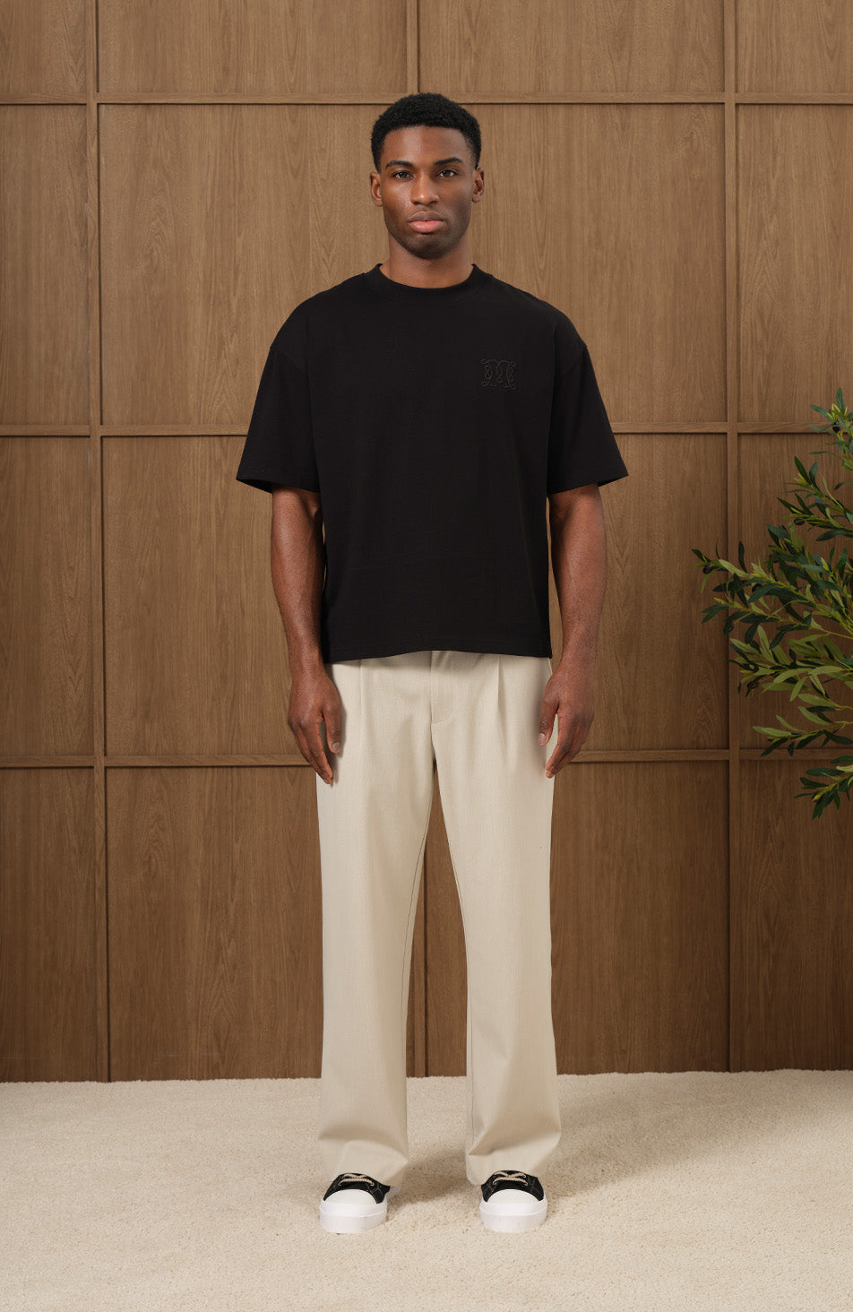 Embossed Monogram Back Logo T Shirt In Black